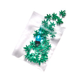 Small Bag of Fake Marijuana and Toy Bong